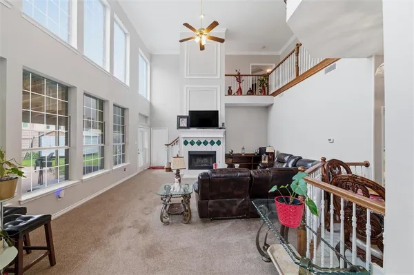 a bedroom with furniture and a chandelier
