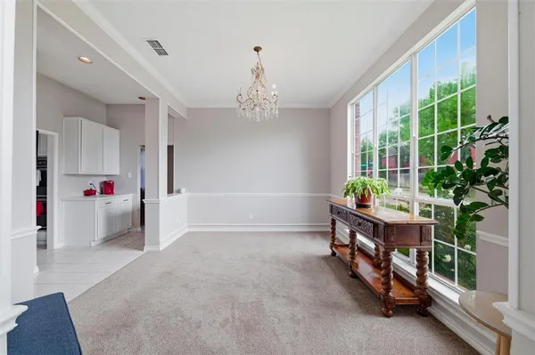 a workspace room with furniture and garden