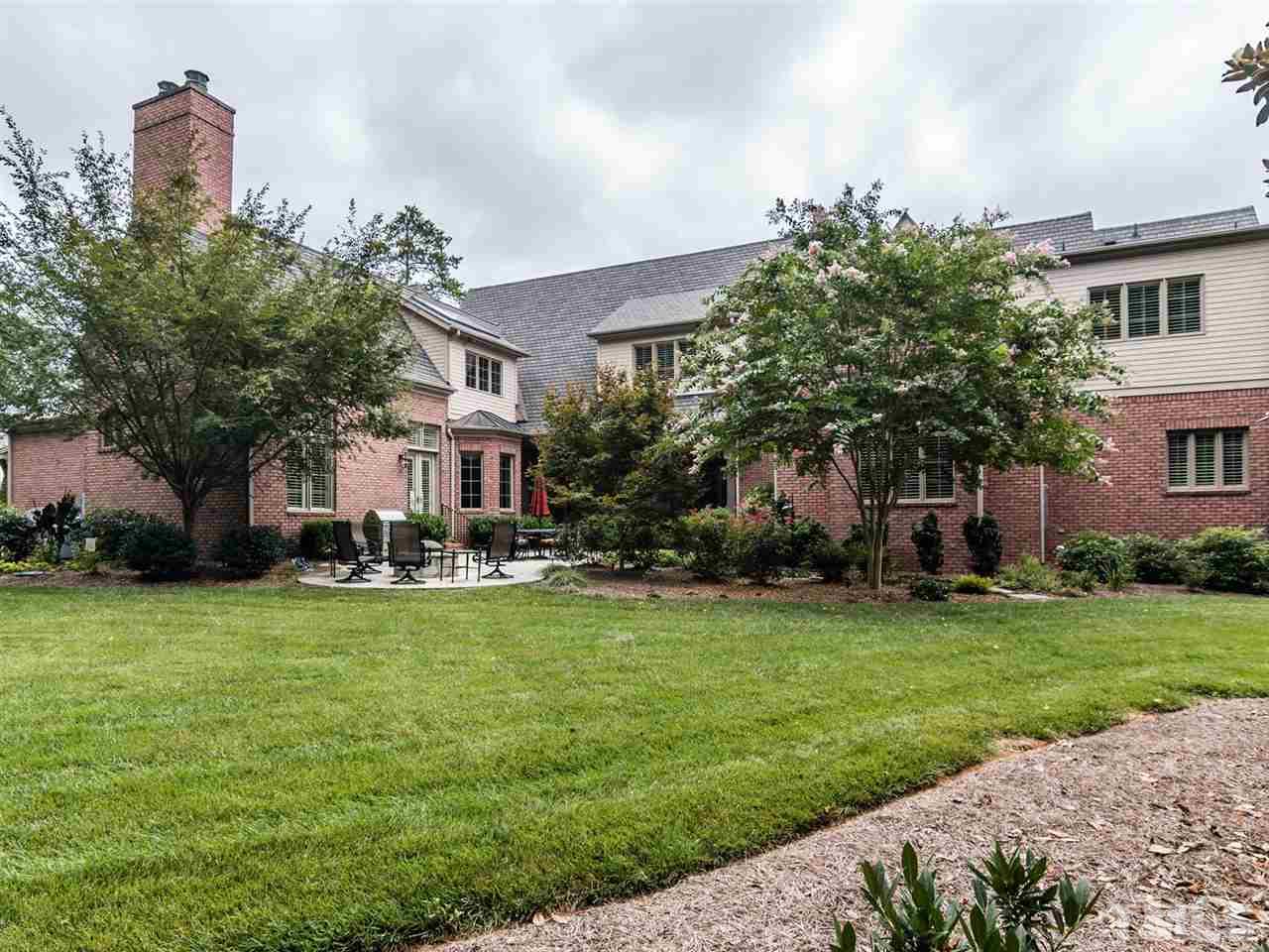 5216 Newstead Manor Lane Raleigh, NC 27606 - Photo 23 of 25 This lovely home sits on a .98 acre lot and has ample space for running and playing. An irrigation system is part of the property as well.