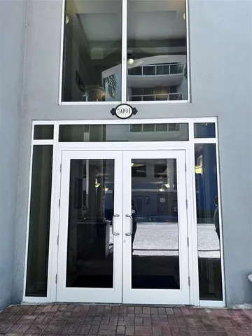 a view of living room with stainless steel appliances