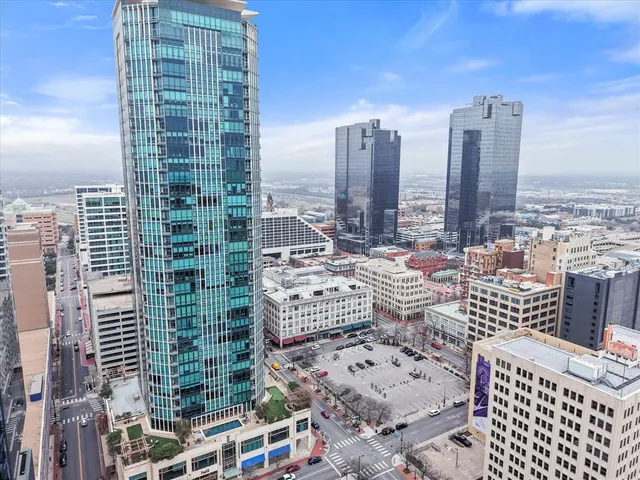 a view of city with tall buildings