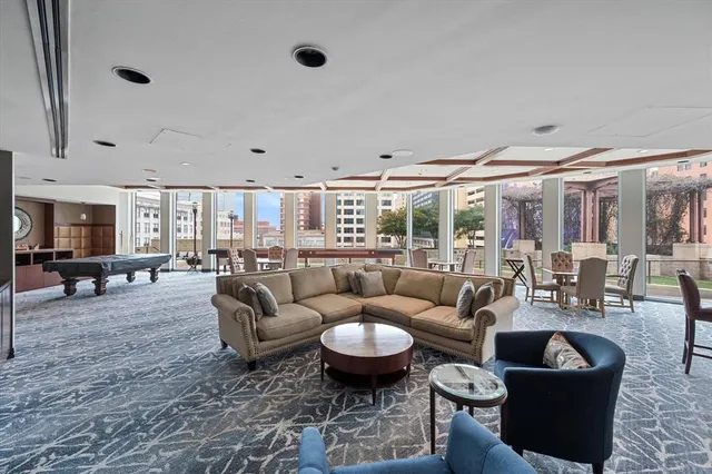 a outdoor space with furniture and wooden floor