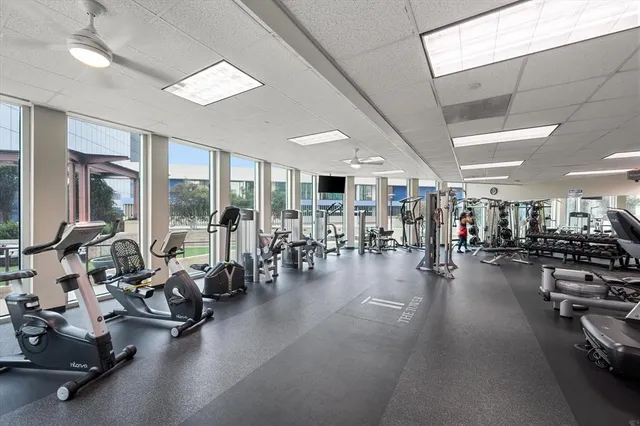 a view of a swimming pool with outdoor seating
