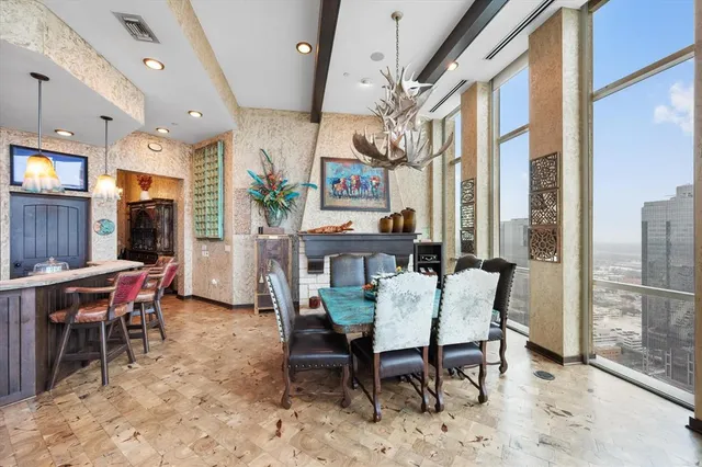 a view of a dining room with furniture