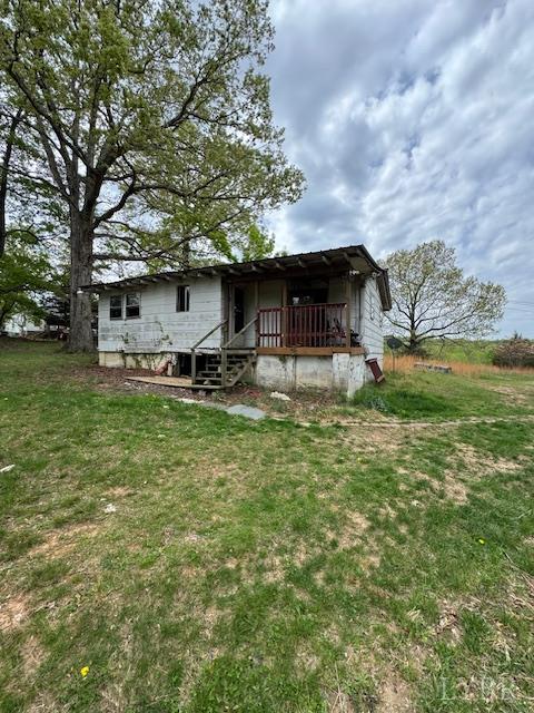 1240 Deep Woods Road Hardy, VA 24101 - Photo 2 of 9 a front view of a house with garden