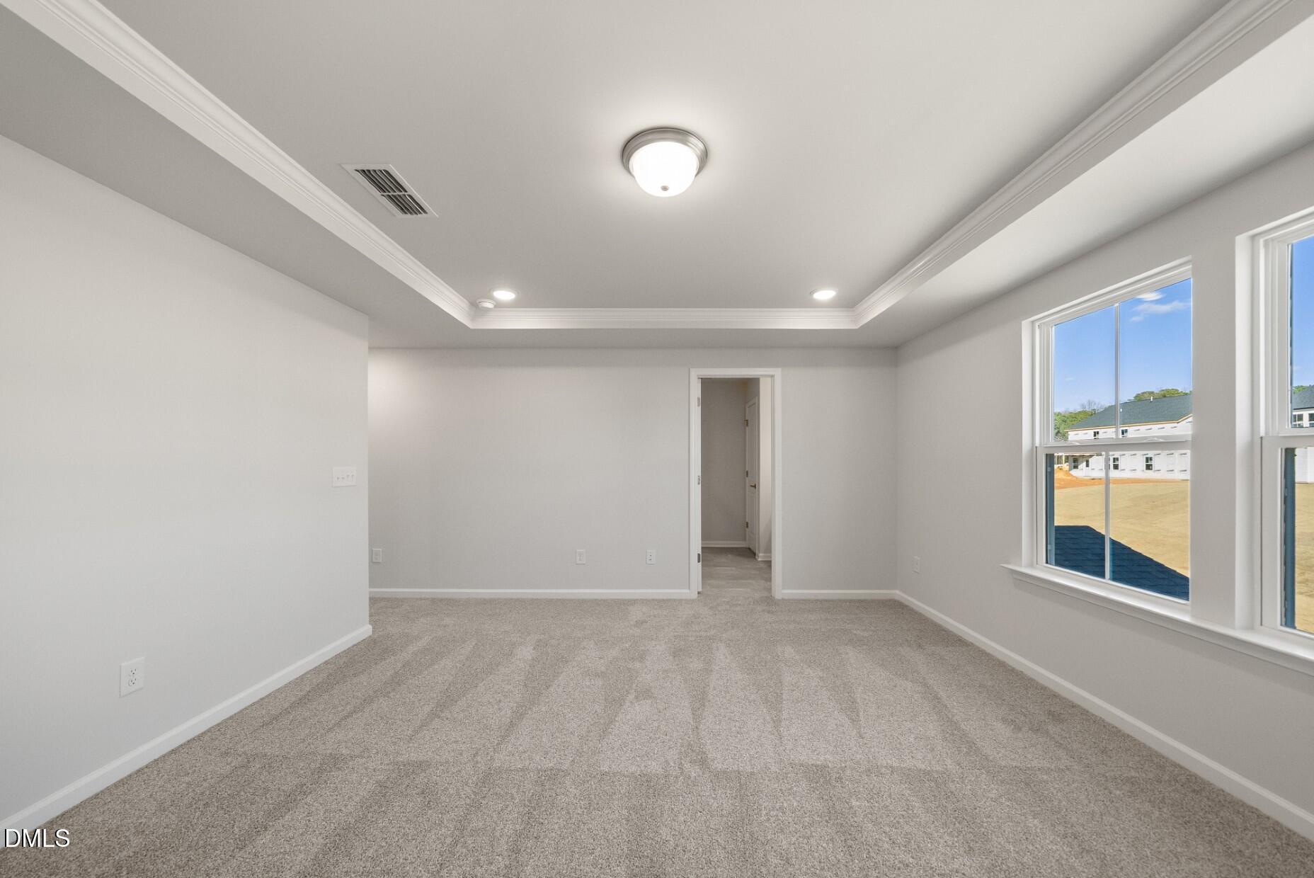 213 Bridle Brk Way Fuquay-Varina, NC 27526 - Photo 12 of 25 a view of an empty room with a window