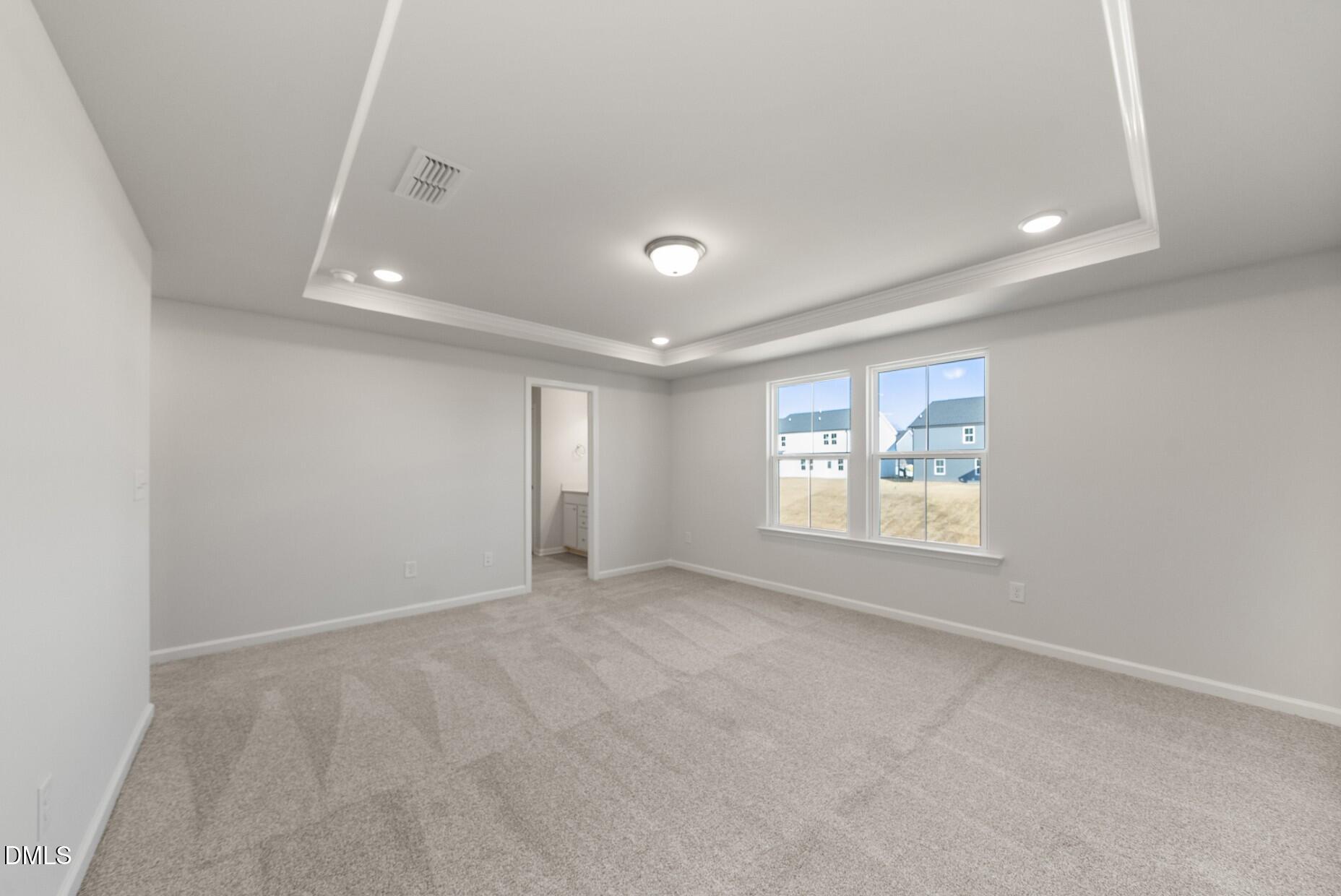 213 Bridle Brk Way Fuquay-Varina, NC 27526 - Photo 13 of 25 an empty room with windows