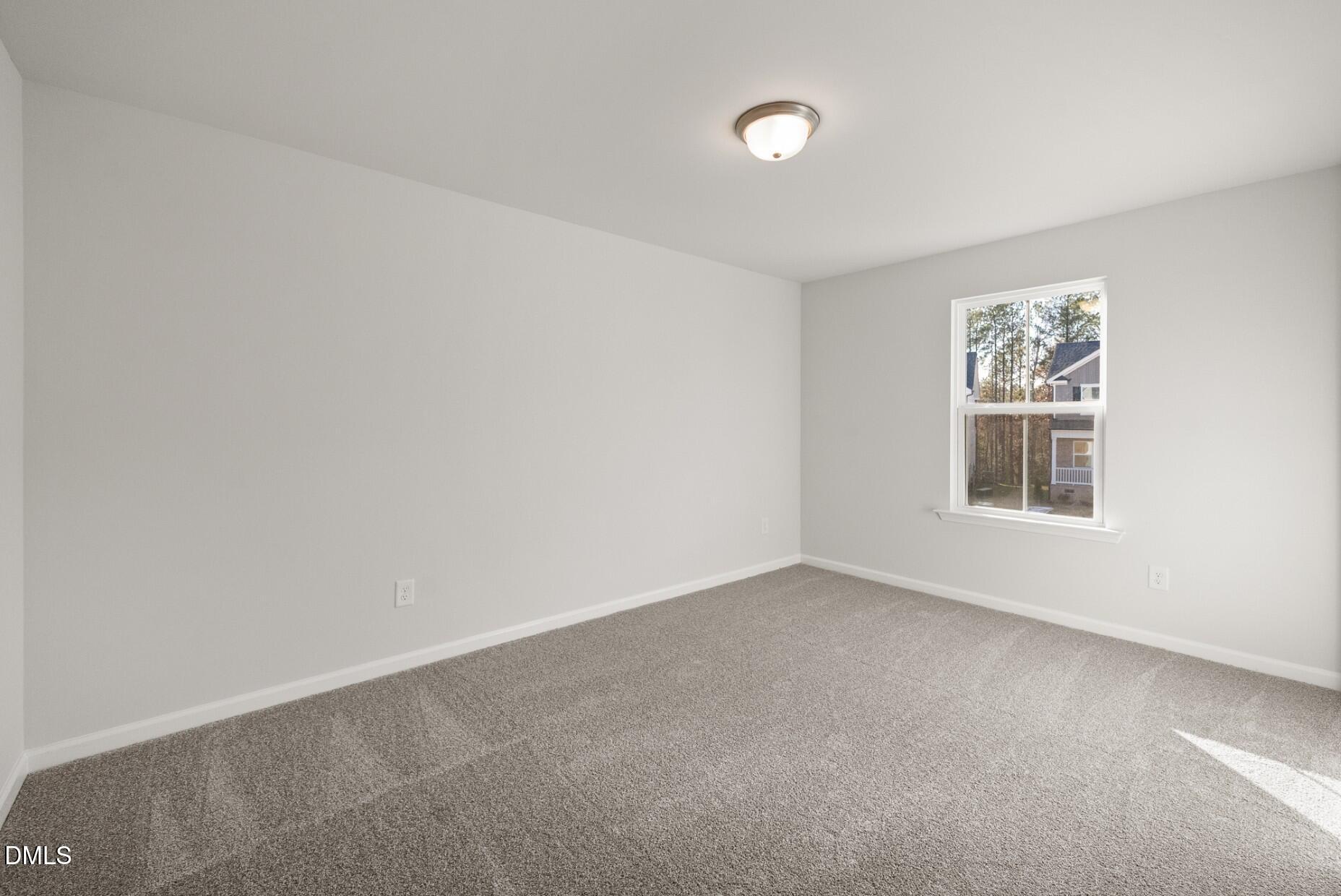 213 Bridle Brk Way Fuquay-Varina, NC 27526 - Photo 20 of 25 an empty room with a window