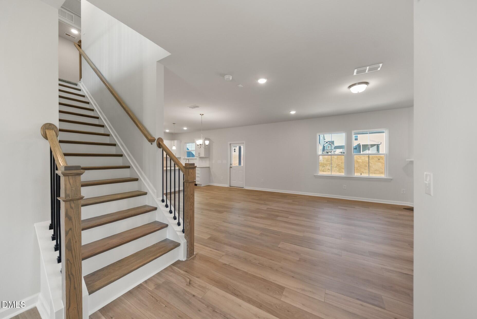 213 Bridle Brk Way Fuquay-Varina, NC 27526 - Photo 9 of 25 a view of entryway with wooden floor