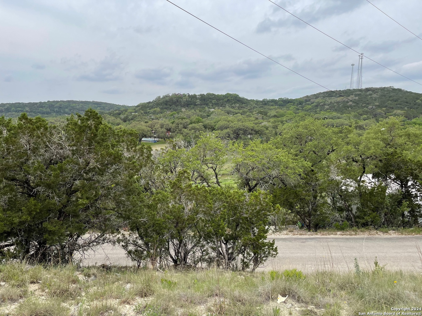 Lots 1-3 5-20 Georges Road Lakehills, TX 78063 - Photo 3 of 17 a view of a field with an trees