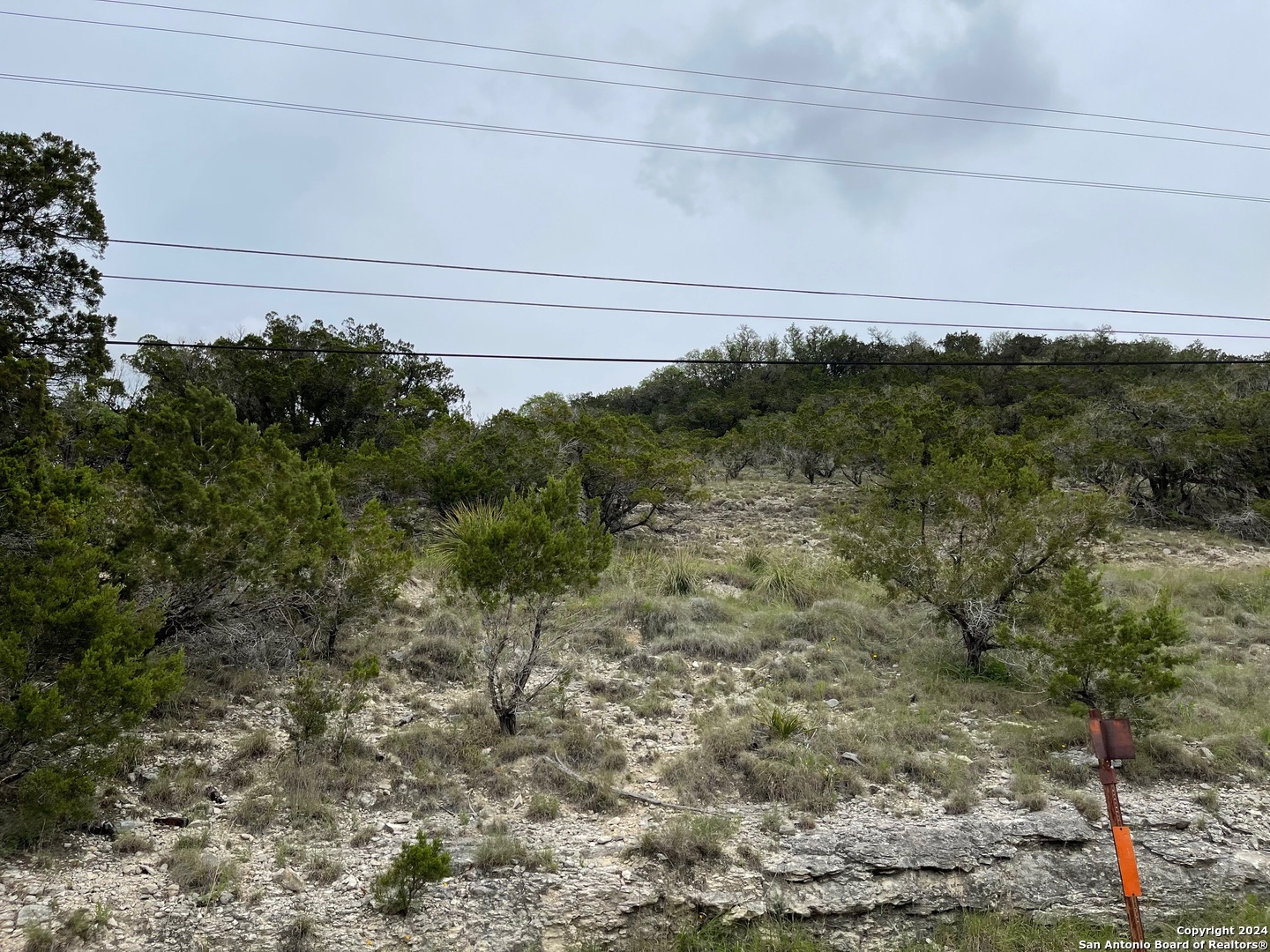 Lots 1-3 5-20 Georges Road Lakehills, TX 78063 - Photo 7 of 17 a view of a dry yard with wooden fence