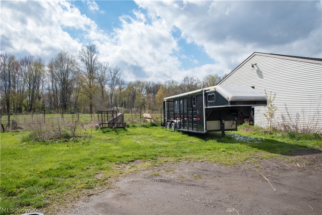 3810 Dawley Road Ravenna, OH 44266 - Photo 26 of 35 Plenty of parking space to maneuver a trailer around! (3rd large door behind trailer)