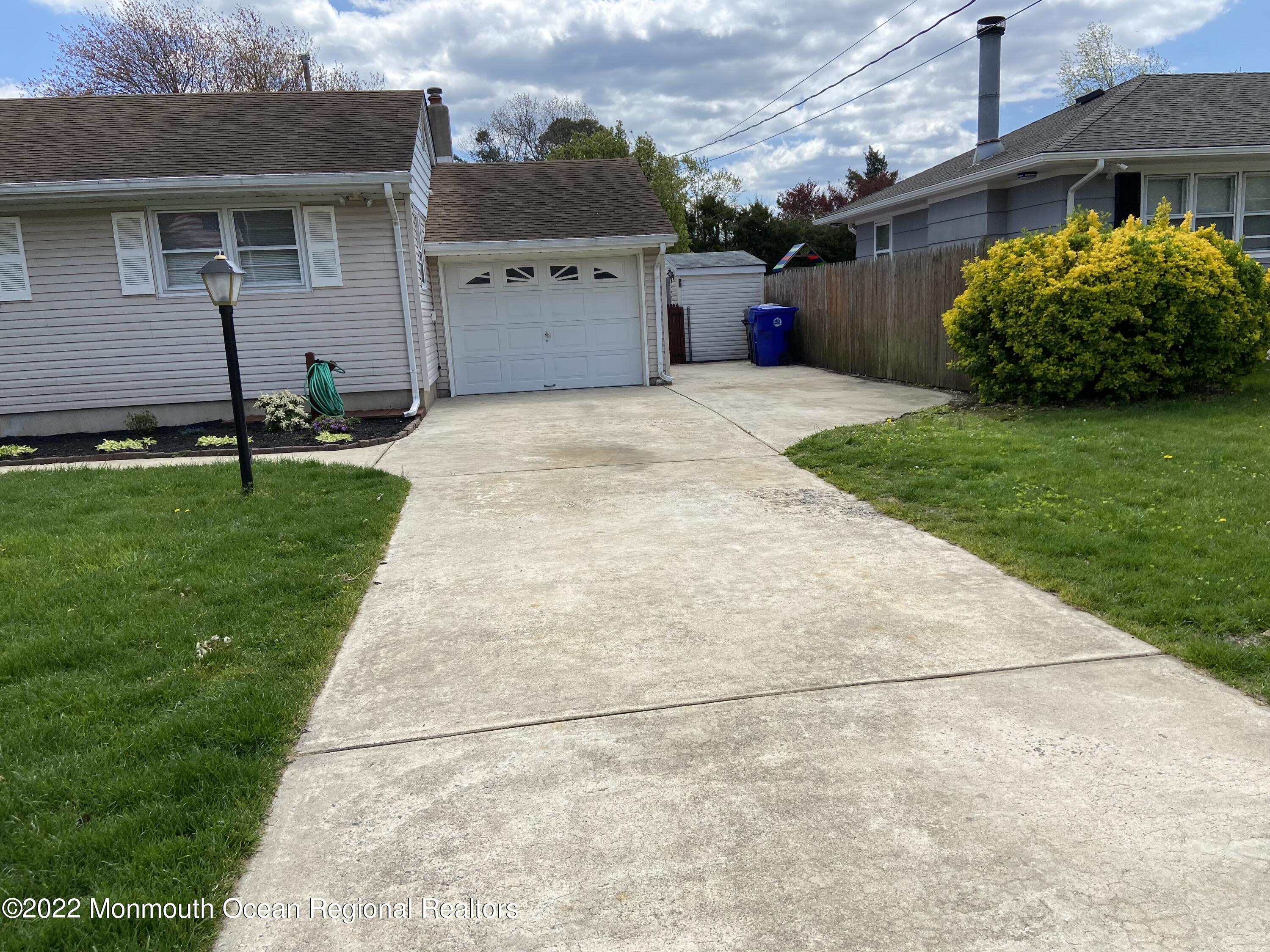 605 Adamston Road Brick, NJ 08723 - Photo 2 of 16 a house view with a garden space