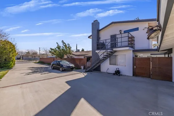 a view of a garage with parked cars