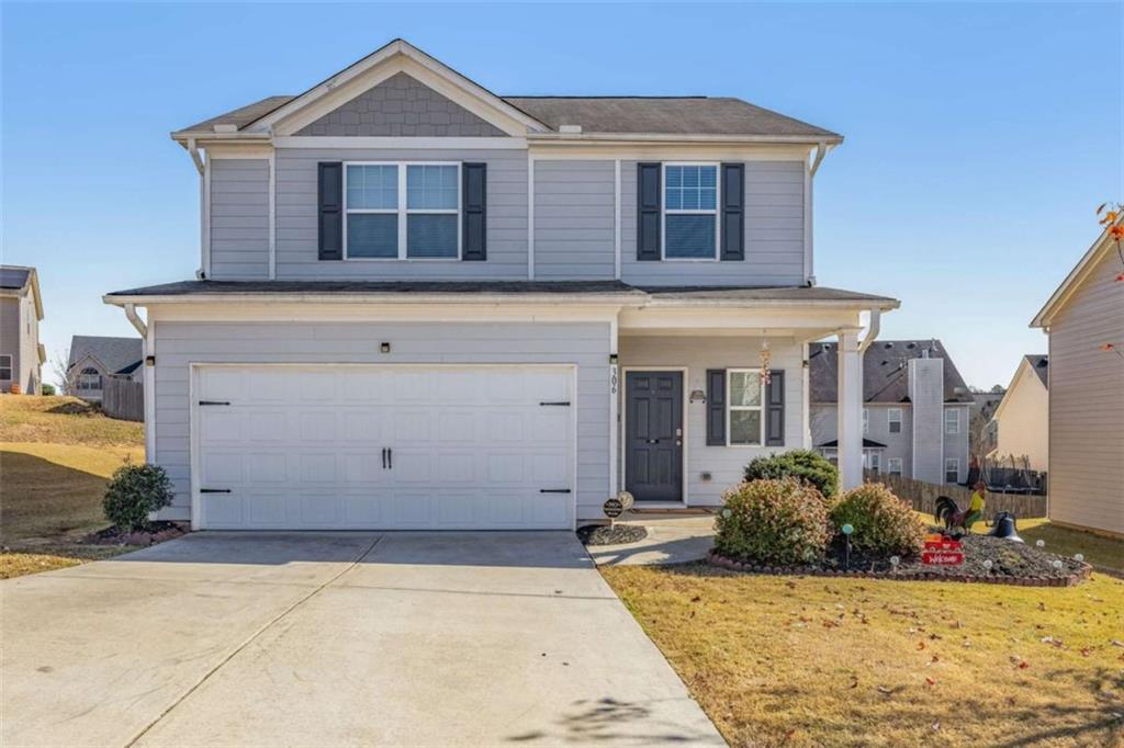306 Seasons Valley Pendergrass, GA 30567 - Photo 2 of 37 a front view of a house with a yard