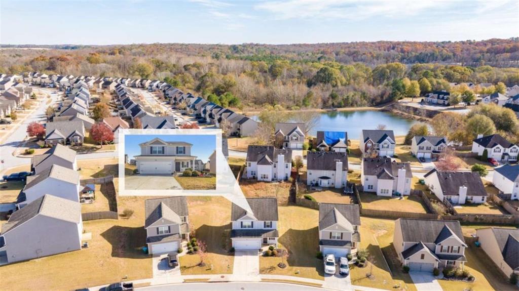 306 Seasons Valley Pendergrass, GA 30567 - Photo 4 of 37 an aerial view of residential houses with outdoor space
