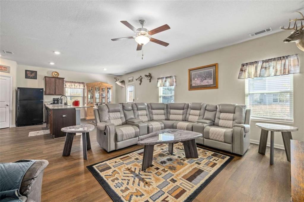 306 Seasons Valley Pendergrass, GA 30567 - Photo 10 of 37 a living room with furniture and a table