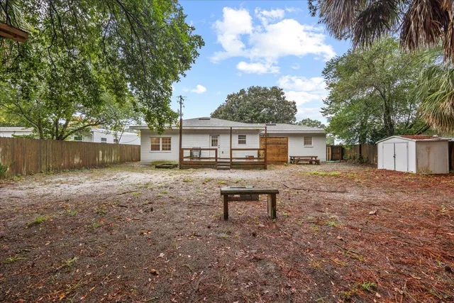 a house view with a sitting space and garden