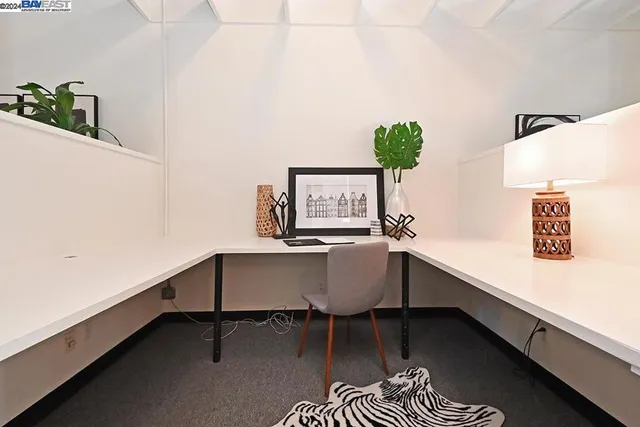 a room with a table and chairs