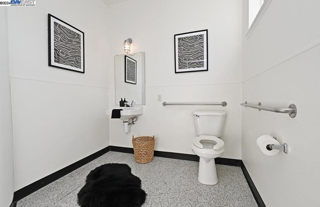 148 Spring Street Pleasanton, CA 94566 - Photo 15 of 46 a bathroom with a toilet and a shower