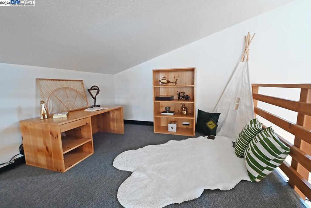 148 Spring Street Pleasanton, CA 94566 - Photo 23 of 46 a bedroom with furniture and white walls