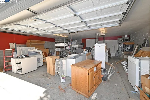 a bedroom with a workspace