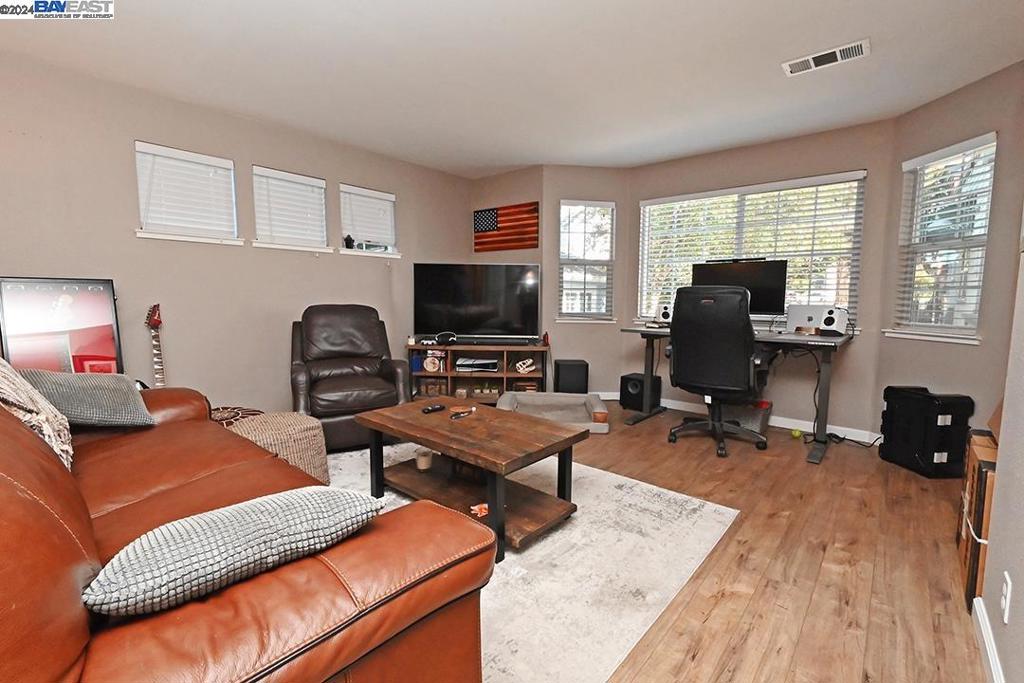 148 Spring Street Pleasanton, CA 94566 - Photo 26 of 46 a bedroom with a workspace