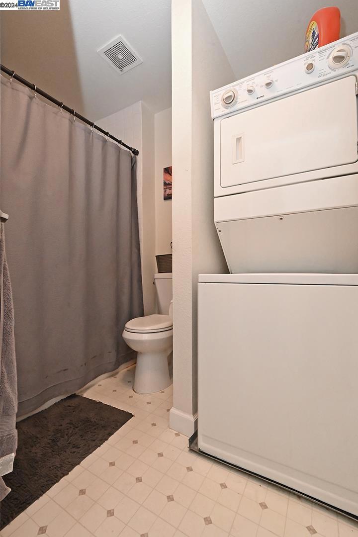 148 Spring Street Pleasanton, CA 94566 - Photo 29 of 46 a bathroom with a sink a toilet and a shower
