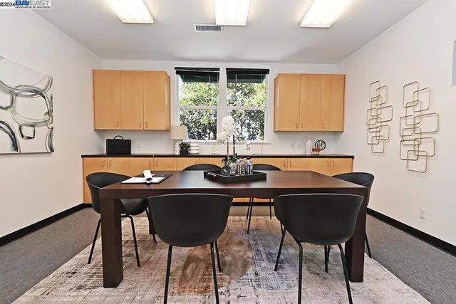 a table and chairs in a room