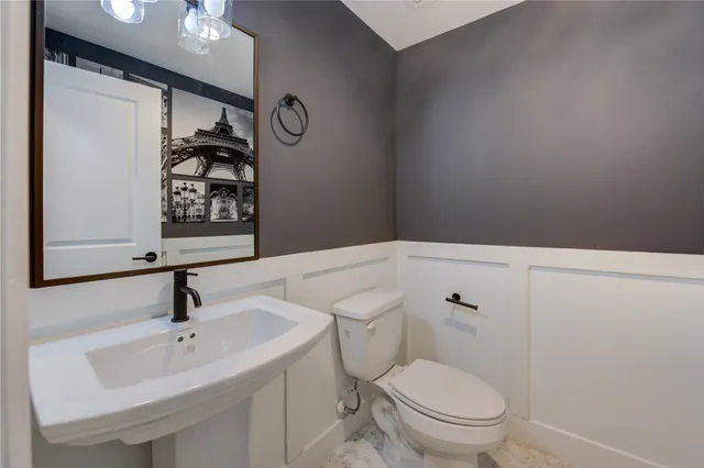 a view of entryway with wooden floor and stairs