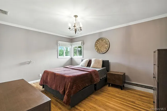 a bedroom with a bed and a table