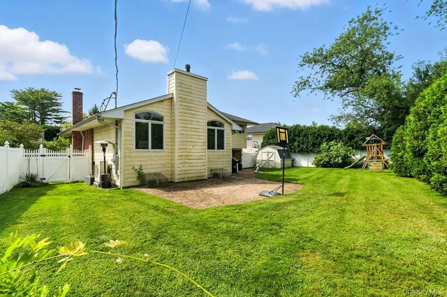 a house view with a backyard space