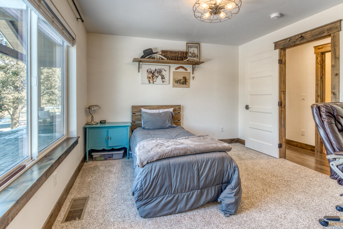 21027 Southwest Gift Road Bend, OR 97703 - Photo 31 of 52 Bedroom 2/Office. Has walk-in closet.