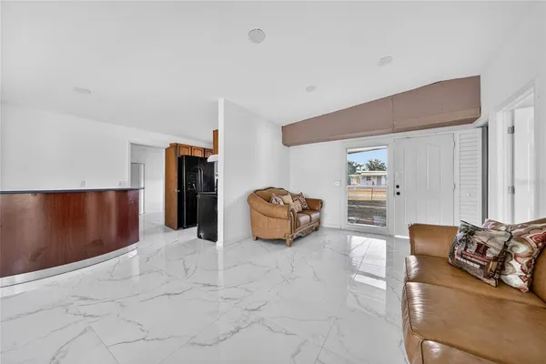 a living room with furniture and a couch