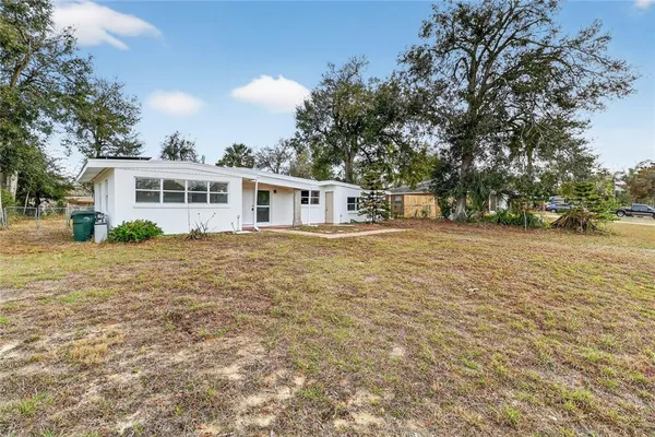 a house view with a garden space