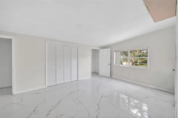 an empty room with windows
