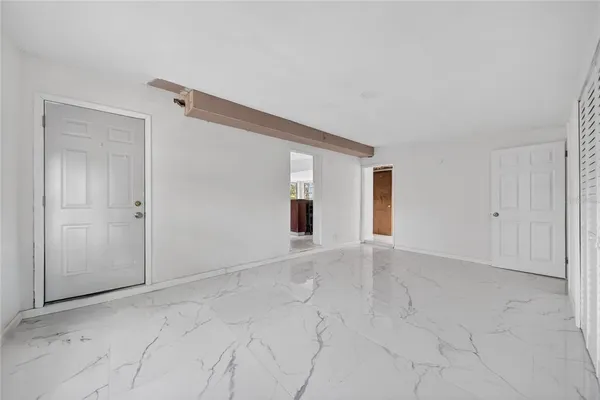 an empty room with an entryway