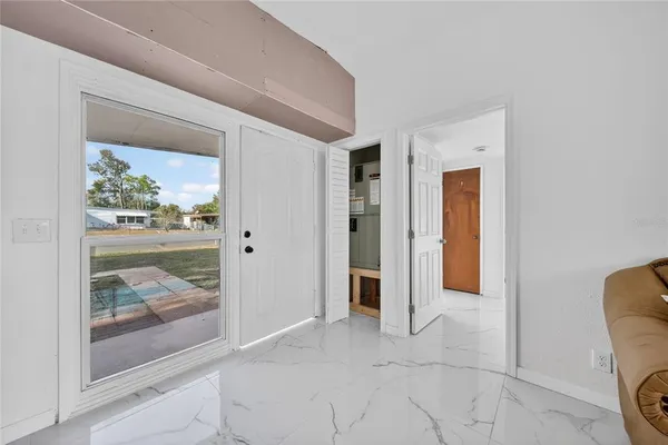 a view of a walk in closet and bedroom