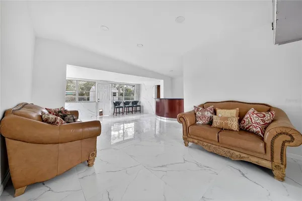 a living room with furniture and a couch