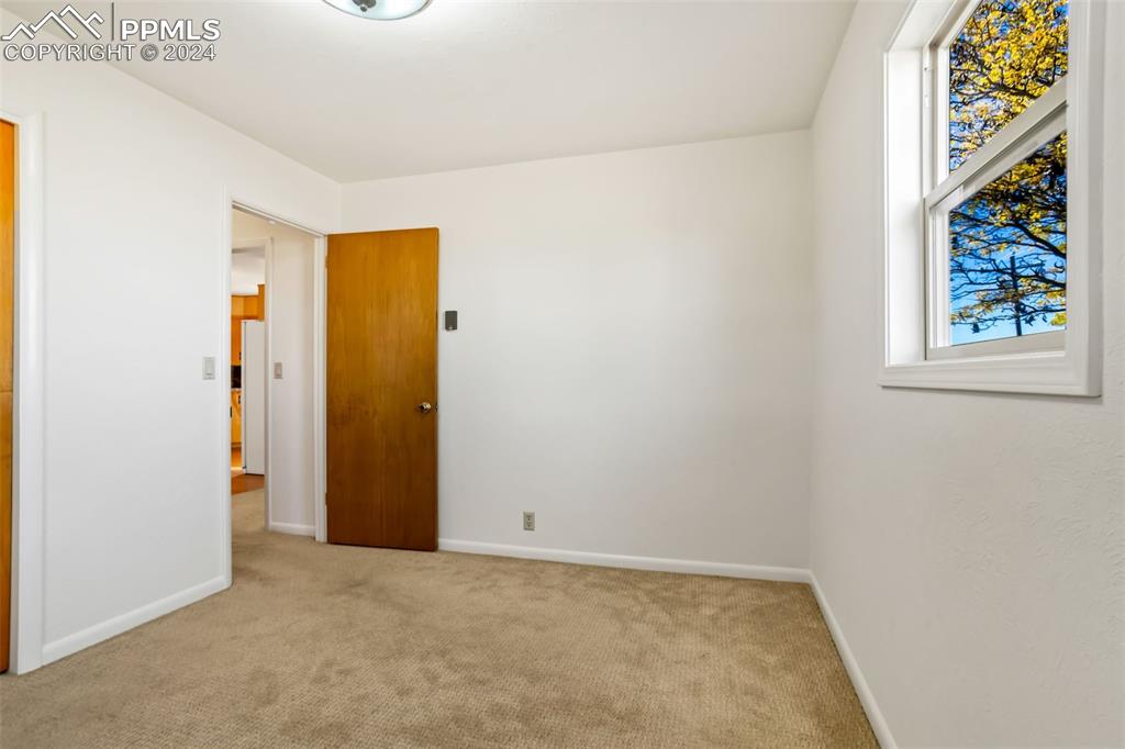 375 North Rush Road Rush, CO 80833 - Photo 12 of 32 an empty room with windows and closet