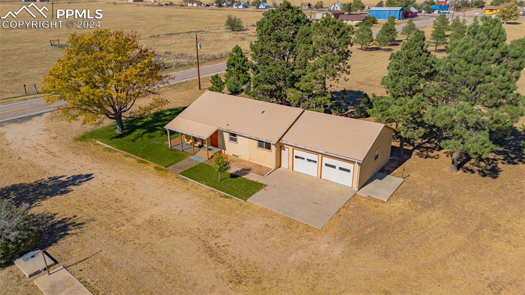 375 North Rush Road Rush, CO 80833 - Photo 30 of 32 an aerial view of a house with a yard and lake view