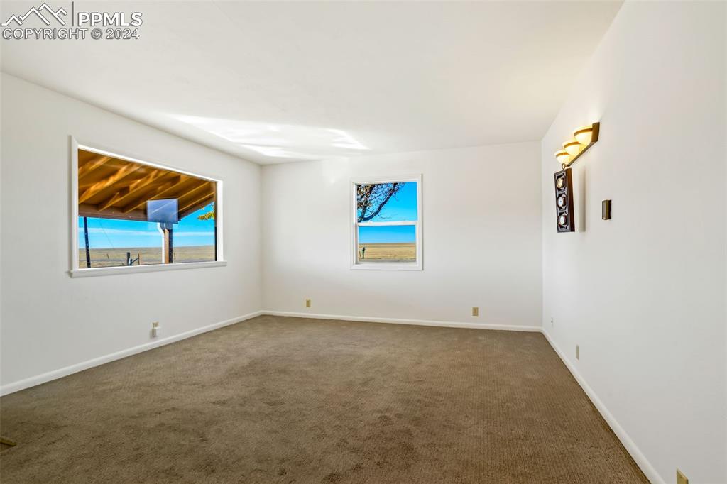 375 North Rush Road Rush, CO 80833 - Photo 10 of 32 an empty room with windows