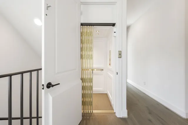 a view of a bathroom from the hallway
