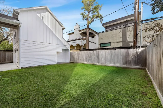 a view of a backyard with a garden