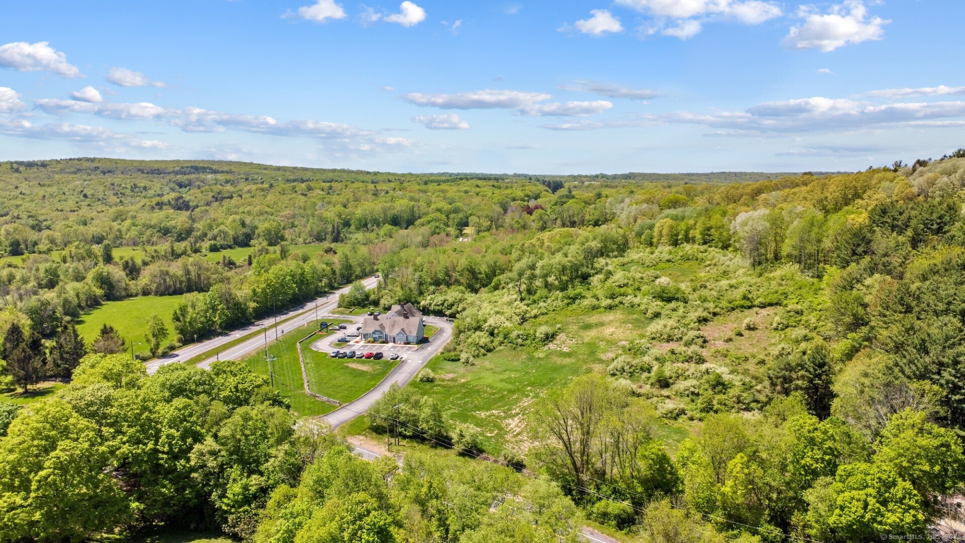 80 Averill Road Pomfret, CT 06259 - Photo 2 of 10 a view of a yard and an trees