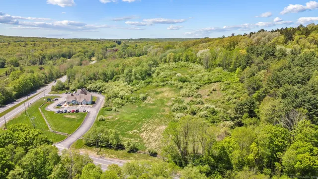 a view of a yard with an outdoor space