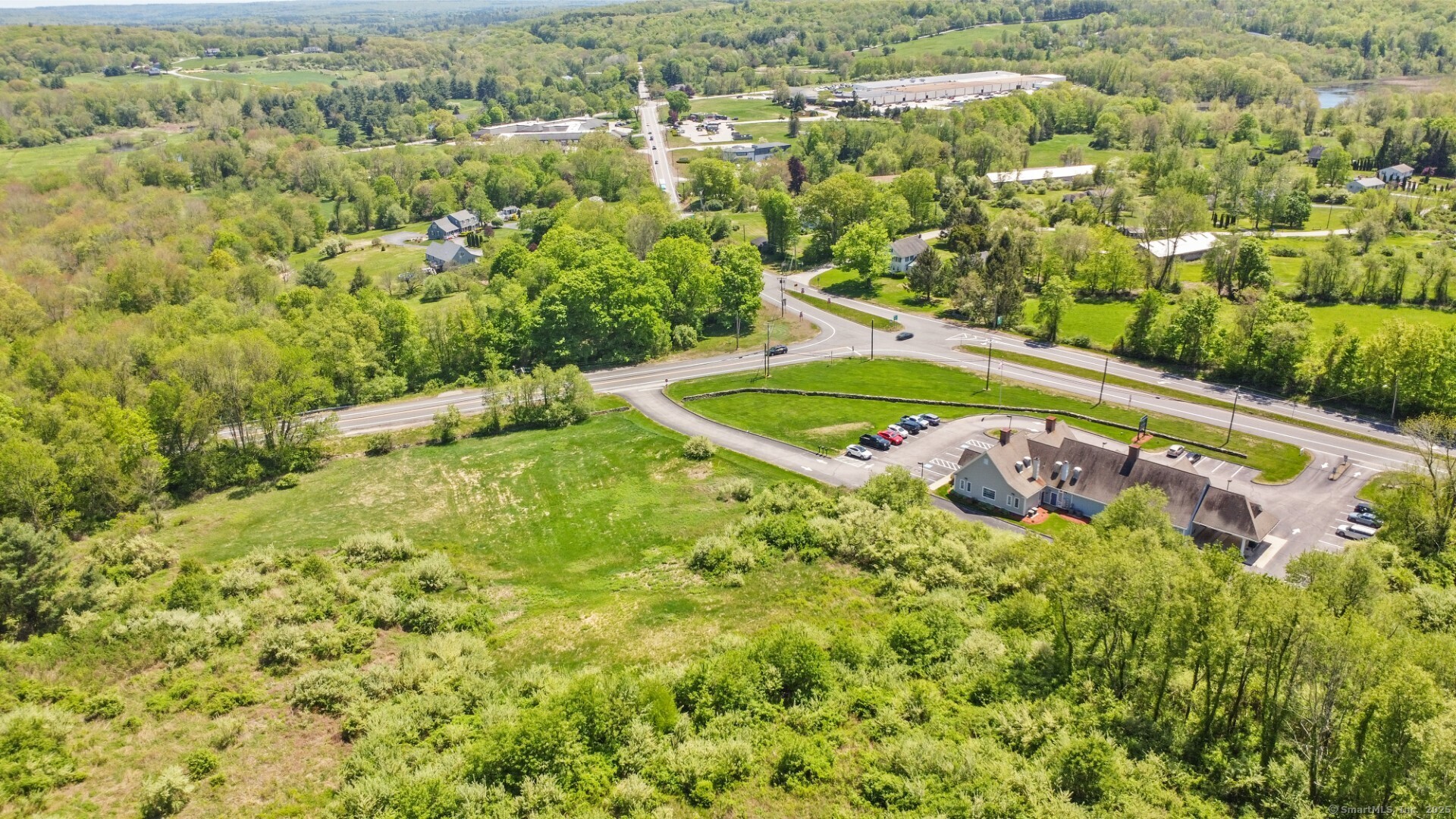 80 Averill Road Pomfret, CT 06259 - Photo 4 of 10 an aerial view of residential houses with outdoor space and trees