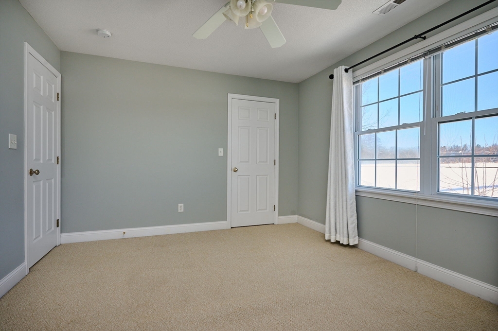 8 Hockanum Road, Unit 10 Northampton, MA 01060 - Photo 12 of 34 an empty room with a empty space and windows