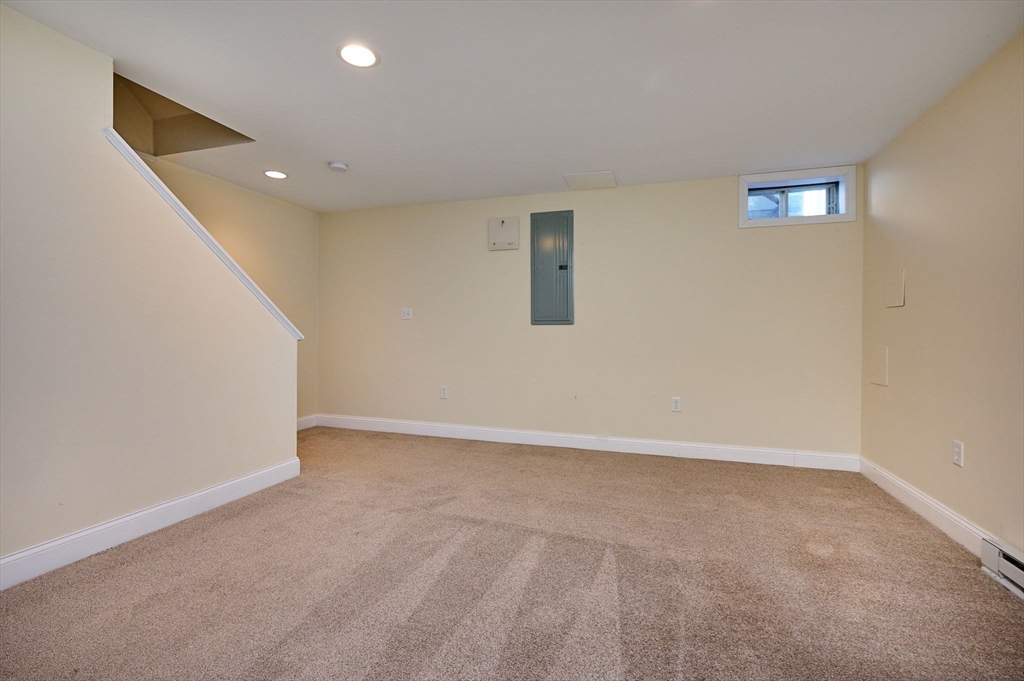 8 Hockanum Road, Unit 10 Northampton, MA 01060 - Photo 18 of 34 a view of an empty room with a window