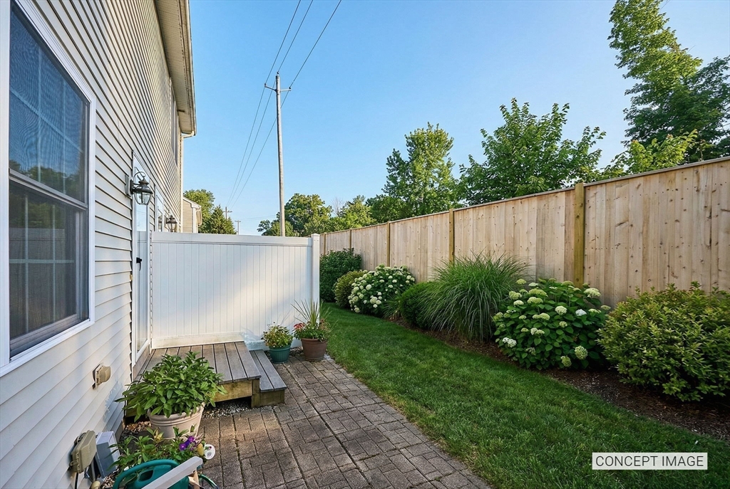 8 Hockanum Road, Unit 10 Northampton, MA 01060 - Photo 21 of 34 a view of a backyard with plants